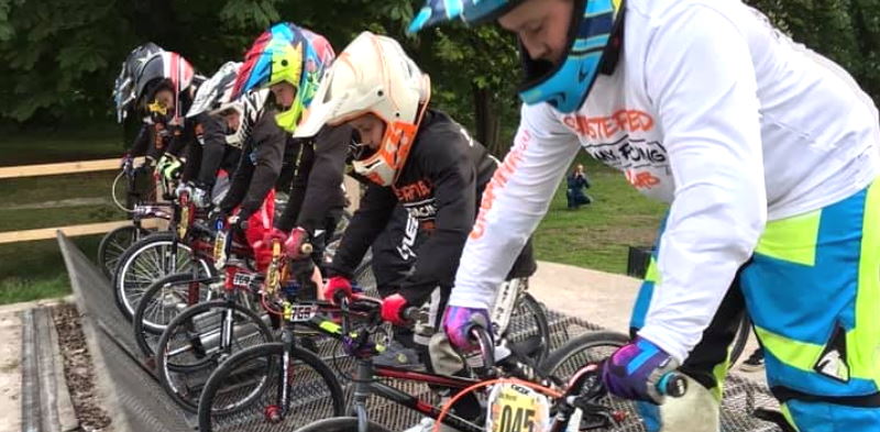 Group of BMX riders at race start